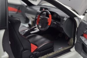 Nissan Skyline GT-R R34 Nismo Z-Tune Fehér MotorHelix 1:18 M83407 Fém – 8. kép a 11-ből