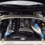 Nissan Skyline GT-R R34 Nismo Z-Tune Fehér MotorHelix 1:18 - image 9 of 11