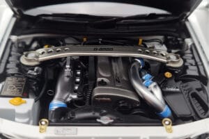 Nissan Skyline GT-R R34 Nismo Z-Tune Fehér MotorHelix 1:18 M83407 Fém – 9. kép a 11-ből