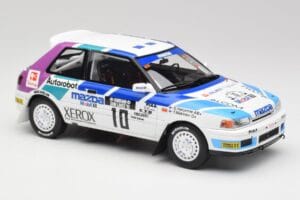 Mazda 323 GTX #10 T. Makinen / S. Harjanne 1000 Lakes Rally 1991 Otto 1:18 OT1099 Gyanta – 4. kép a 6-ből