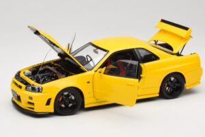Nissan Skyline GT-R R34 Customized Version Sárga MotorHelix 1:18 M83412 Fém – 2. kép a 8-ből