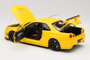 Nissan Skyline GT-R R34 Customized Version Sárga MotorHelix 1:18 M83412 Fém – 5. kép a 8-ből