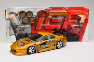 Toyota Supra A80 Arany Tunerz Edition Hot Wheels 1:18 B6091 Fém – 2. kép a 7-ből