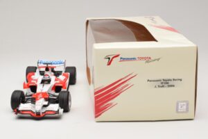 Panasonic Toyota Racing TF106 #11 J. Trulli 2006 Minichamps 1:18 AM59558L Fém – 6. kép a 7-ből