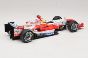 Panasonic Toyota Racing TF106 #12 R. Schumacher 2006 Minichamps 1:18 AM59557K Fém – 2. kép a 7-ből