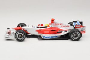 Panasonic Toyota Racing TF106 #12 R. Schumacher 2006 Minichamps 1:18 AM59557K Fém – 3. kép a 7-ből