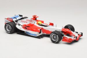 Panasonic Toyota Racing TF106 #12 R. Schumacher 2006 Minichamps 1:18 AM59557K Fém – 4. kép a 7-ből