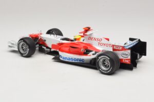 Panasonic Toyota Racing TF106 #12 R. Schumacher 2006 Minichamps 1:18 AM59557K Fém – 5. kép a 7-ből