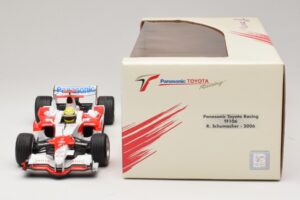 Panasonic Toyota Racing TF106 #12 R. Schumacher 2006 Minichamps 1:18 AM59557K Fém – 6. kép a 7-ből
